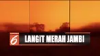 Kabut asap makin pekat, langit di Muaro Jambi, Provinsi Jambi, berubah jadi merah seperti di Planet Mars.