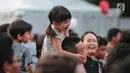 Seorang anak kecil menghadiri hari pertama acara Jak-Japan Matsuri 2018 di Gelora Bung Karno, Senayan, Jakarta, Sabtu (8/9). Untuk bisa menikmati acara, Anda hanya perlu merogoh kocek sebesar Rp 40.000. (Liputan6.com/Faizal Fanani)