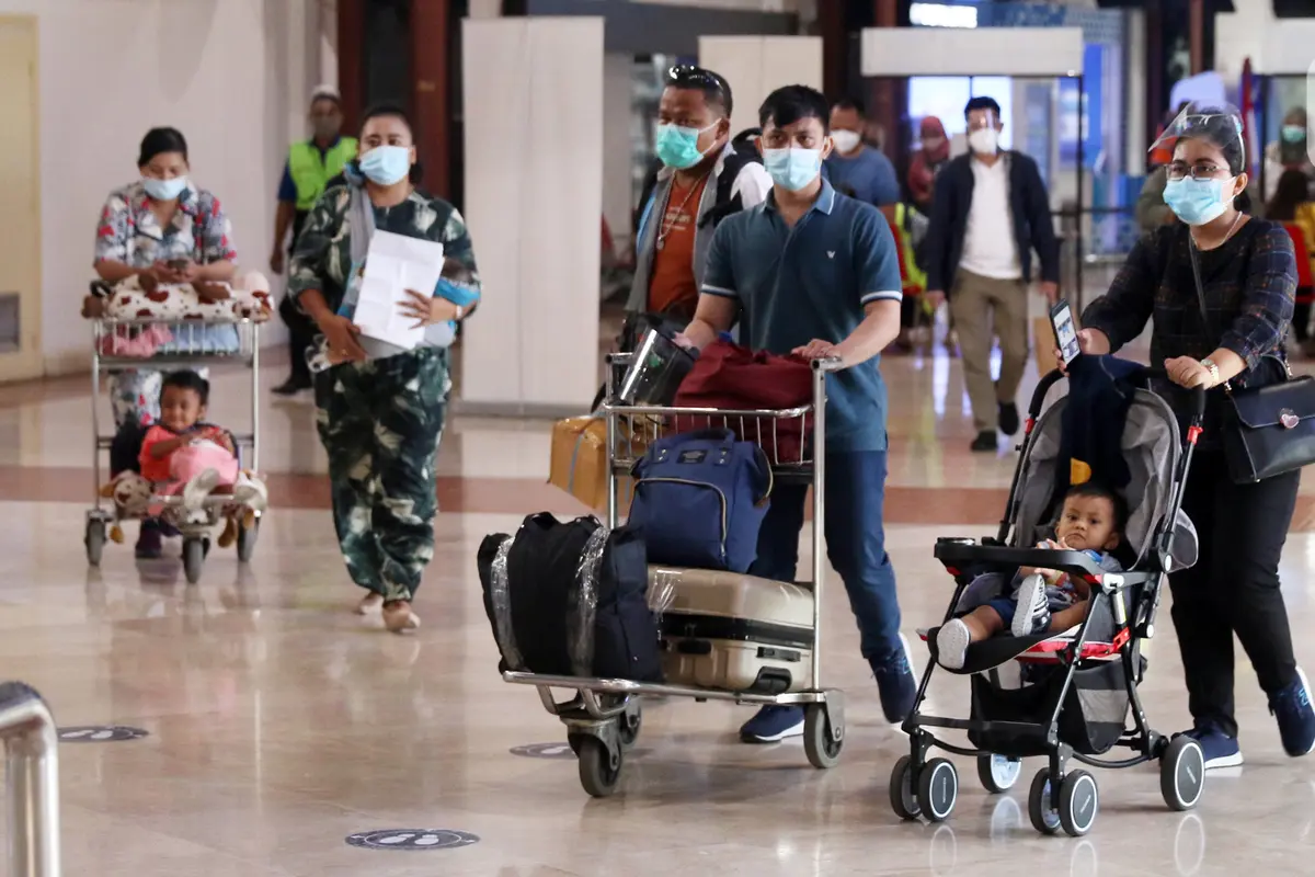 FOTO: Libur Panjang, Bandara Soetta Dipenuhi Penumpang