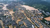 Aksi Heroik Seorang Suami di China Saat Banjir, Pilih Selamatkan Istri Dibanding Diri Sendiri
