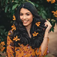 ilustarsi perempuan bahagia/Photo by Renato Abati from Pexels