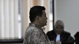 Teddy Renyut terbukti bersalah dan memberi uang suap SGD 100 ribu kepada Bupati Biak Numfor Yesaya Sombuk, Jakarta, Rabu (29/10/2014). (Liputan6.com/Miftahul Hayat)