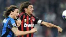 AC Milan's Paolo Maldini fights for the ball with Inter Milan's Zlatan Ibrahimovic during their Serie A match at Milan's San Siro Stadium on September 28, 2008. AFP PHOTO/Filippo MONTEFORTE
