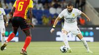 Pada pertandingan ini, Karim Benzema diduetkan bareng Abderazak Hamdalah di depan dengan ditopang Jota dan Romarinho. (AFP Photo)