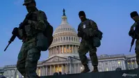Pasukan Garda Nasional memperkuat zona keamanan di Capitol Hill di Washington pada 19 Januari 2021, sehari sebelum Presiden terpilih Joe Biden dilantik sebagai presiden ke-46 Amerika Serikat. (Foto: AP / J. Scott Applewhite)