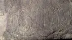 Runestone yang ditemukan di Tyrifjorden, Norwegia, diperlihatkan di Museum Sejarah Budaya di Oslo, pada 12 Januari 2023. Para arkeolog dari Museum Sejarah Kebudayaan di Oslo pada Selasa, 17 Januari 2023, mengatakan mereka menemukan batu bertuliskan alfabet rune yang mereka klaim sebagai yang tertua di dunia. (Javad Parsa/NTB Scanpix via AP)