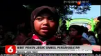 Murid SDN 01 Nambangan Lor makan pagi bersama dengan murid SDK Santa Maria di Kota Madiun, Jawa Timur. Makan bersama diadakan sebagai bentuk penghormatan dan toleransi kepada murid SDK Santa Maria yang akan merayakan Hari Natal.