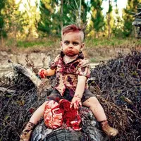 Bukan tanpa alasan mengapa wanita ini memilih tema zombie untuk pemotretan anak pertamanya dan ternyata alasannya sangat mengharukan. (Foto: Amanda Queen Photography / Caters)