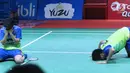 Selebrasi ganda campuran Indonesia, Tontowi Ahmad/Liliyana Natsir usai mengalahkan Chan Peng Soon/Goh Liu Ying (Malaysia) pada Final Indonesia Open 2018 di Istora GBK, Minggu (8/7). Tontowi/Liliyana unggul 21-17, 21-8. (Liputan6.com/Helmi Fithriansyah)