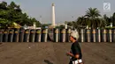 Tameng polisi terlihat saat aksi Kamisan ke-589 di depan Istana Merdeka, Jakarta, Kamis (20/6/2019). Dalam aksinya, JSKK meminta Presiden Joko Widodo juga menghapus impunitas sebagaimana tercantum dalam Nawacita. (Liputan6.com/Johan Tallo)