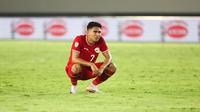 Ekspresi kecewa pemain Timnas Indonesia, Marselino Ferdinan setelah gagal mencetak gol ke gawang Filipina pada laga Grup B Piala AFF 2024 yang berlangsung di Stadion Manahan, Solo, Jawa Tengah, Sabtu (21/12/2024). (Bola.com/Abdul Aziz)