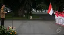 Presiden Jokowi memberikan amanat kepada atlet Indonesia yang akan berlaga di SEA Games XXVIII Singapura, Jakarta, Selasa (26/5/2015). Presiden berpesan agar para atlet berjuang sekuat tenaga mengharumkan nama bangsa. (Liputan6.com/Faizal Fanani)