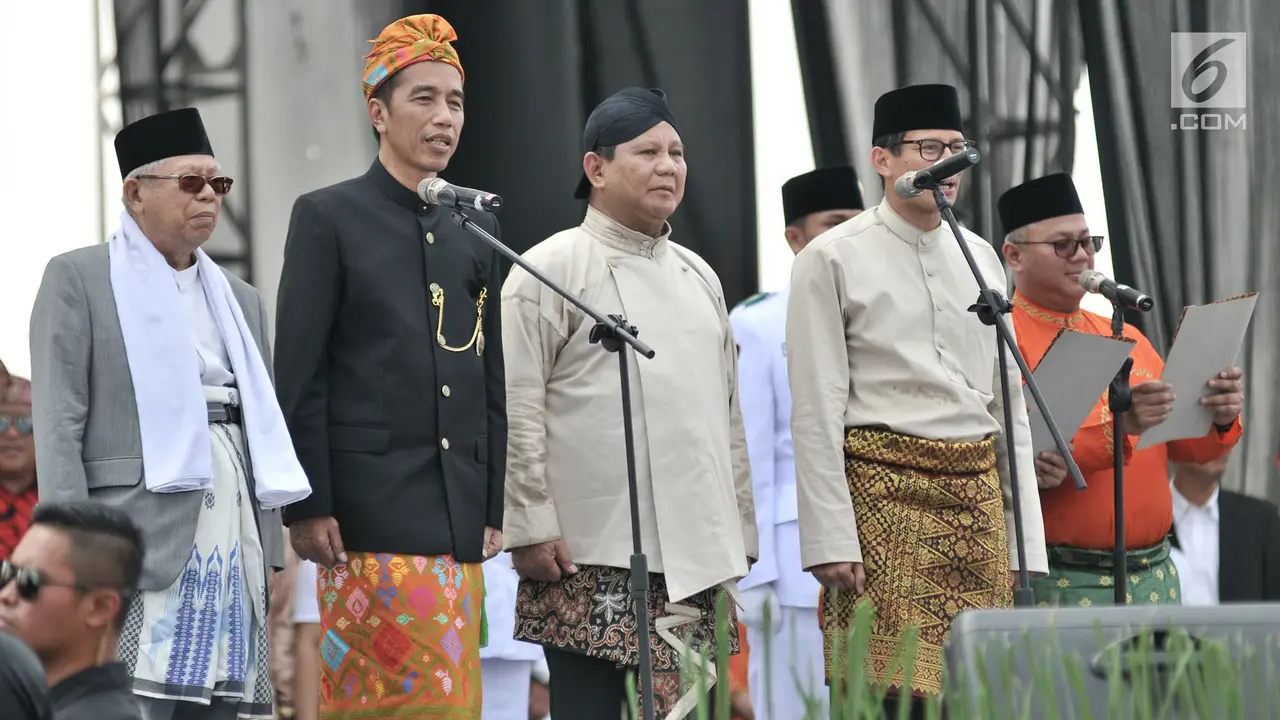 Berbaju Adat, Capres - Cawapres Ikuti Rangkaian Deklarasi Kampanye Damai