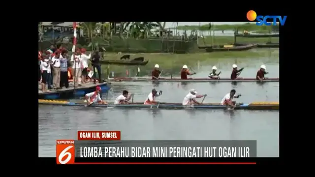 Peringati HUT ke-15 Kabupaten Ogan Ilir, sejumlah warga ikuti lomba perahu tradisional bidar mini.