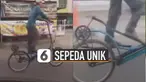 Bentuk sepeda yang digunakan pria tersebut hampir mirip alat olahraga treadmill.