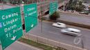 Suasana di Jalan Tol Jakarta-Bogor-Ciawi (Jagorawi) terpantau Lancar, Jakarta, Kamis (14/5/2015). Jelang hari libur panjang warga Jakarta dan sekitarnya biasa memanfaatkan liburan ke luar kota. (Liputan6.com/Helmi Afandi)