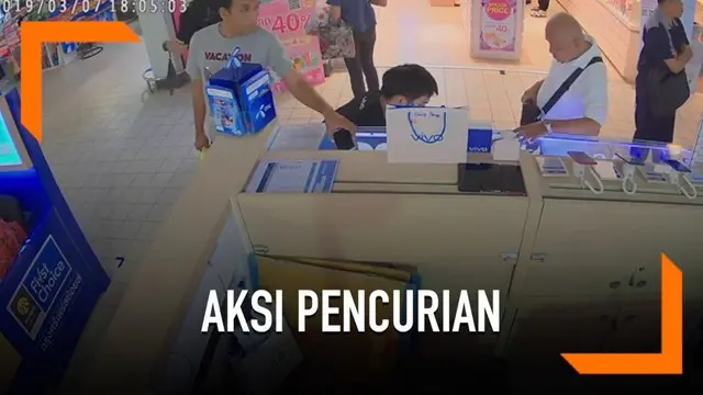 Rekaman seorang pria melakukan aksi pencurian di pusat perbelanjaan Thailand. Ia mengambil iPhone XR milik karyawan toko ponsel.