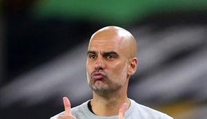 Pelatih Manchester City Josep Guardiola (AP/Martin Rickett)