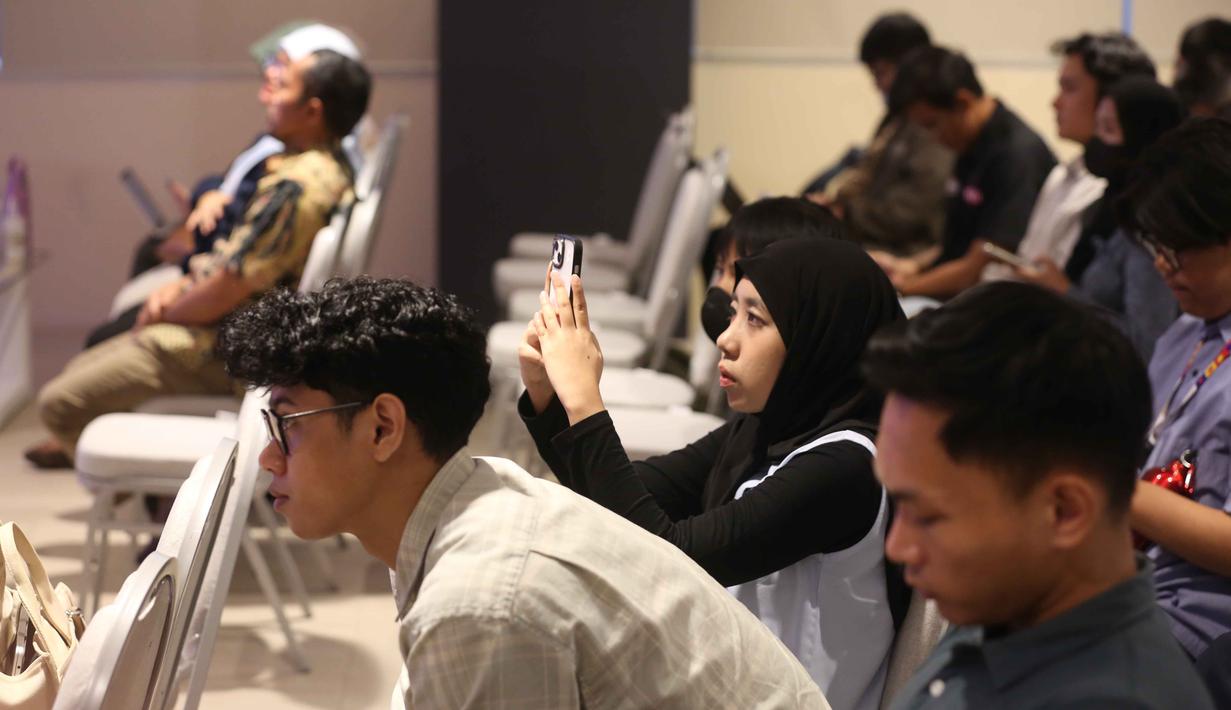 Antusiasme peserta seminar Upstream Force We Are The Energy di Auditorium Lantai 2 Gedung Interdisciplinary Engineering Fakultas Teknik Universitas Indonesia (IDE FTUI), Depok, Jawa Barat, Selasa (4/11/2025). (Liputan6.com/Helmi Fithriansyah)