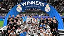 Real Madrid menjadi juara UEFA Super Cup setelah mengalahkan Eintracht Frankfurt dengan skor 2-0 pada laga yang berlangsung di Helsinki 10 August 2022. (AFP/Javier Soriano)