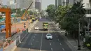 Suasana jalanan di Jakarta lenggang, Rabu (09/12). Hal ini karena adanya hari libur nasional dan Pilkada di beberapa daerah. (Liputan6.com/Gempur M Surya)