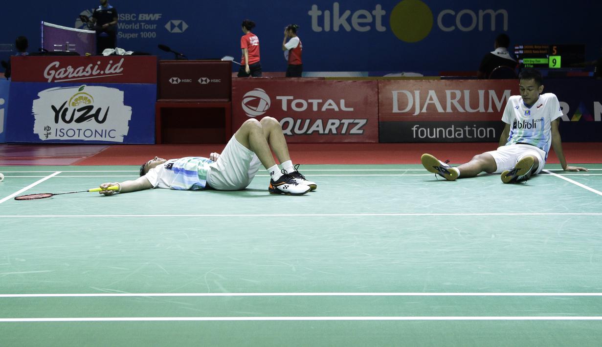 Ganda putra Indonesia, Fajar Alfian/Muhammad Rian Ardianto, saat melawan ganda China, Huang Kai Xiang/Liu Cheng, pada Blibli Indonesia Open 2019 di Istora Senayan, Jakarta, Rabu (17/7). Fajar/Rian menang 18-21, 21-14, 21-16. (Bola.com/Yoppy Renato)