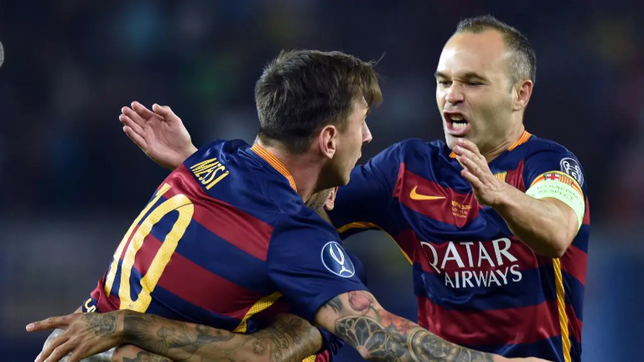 Lionel Messi dan Andres Iniesta (AFP PHOTO/KIRILL KUDRYAVTSEV )