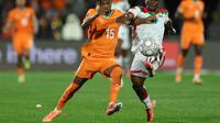 Pemain Pantai Gading Amad Diallo (kiri) saat bertemu Burkina Faso pada ajang Piala Afrika 2025. (FRANCK FIFE / AFP)