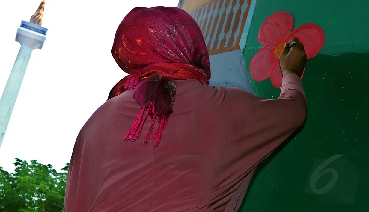 Festival Mural ini mengambil tema  "Jakarta baru, Jakarta bersih", Sabtu (30/8/14). (Liputan6.com/Faisal R Syam) 