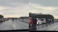 Pemobil foto di tengah jalan tol (Instagram/@dashcamindonesia)