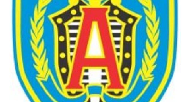 Lencana Alpha Group. (Wikimedia Commons)