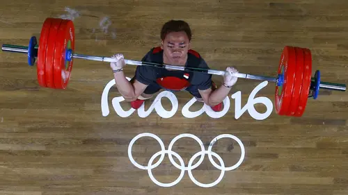 Pada Olimpiade Rio 2016, Eko Yuli Irawan yang berlomba di kelas 62 kg memperbaiki prestasinya dengan meraih medali perak dengan angkatan total 312 kg. (AFP/Pool/Stoyan Nenov)