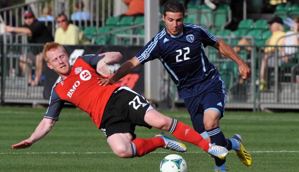 Richard Eckersley (kiri) sempat merasakan latihan bersama beberapa pemain papan atas, seperti Wayne Rooney, Cristiano Ronaldo, Paul Scholes, maupun Ryan Giggs.  (Al Messerschmidt/Getty Images/AFP)