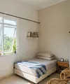 Trik Menata Jendela Kamar Tidur Agar Terasa Lebih Luas (AI Generated)