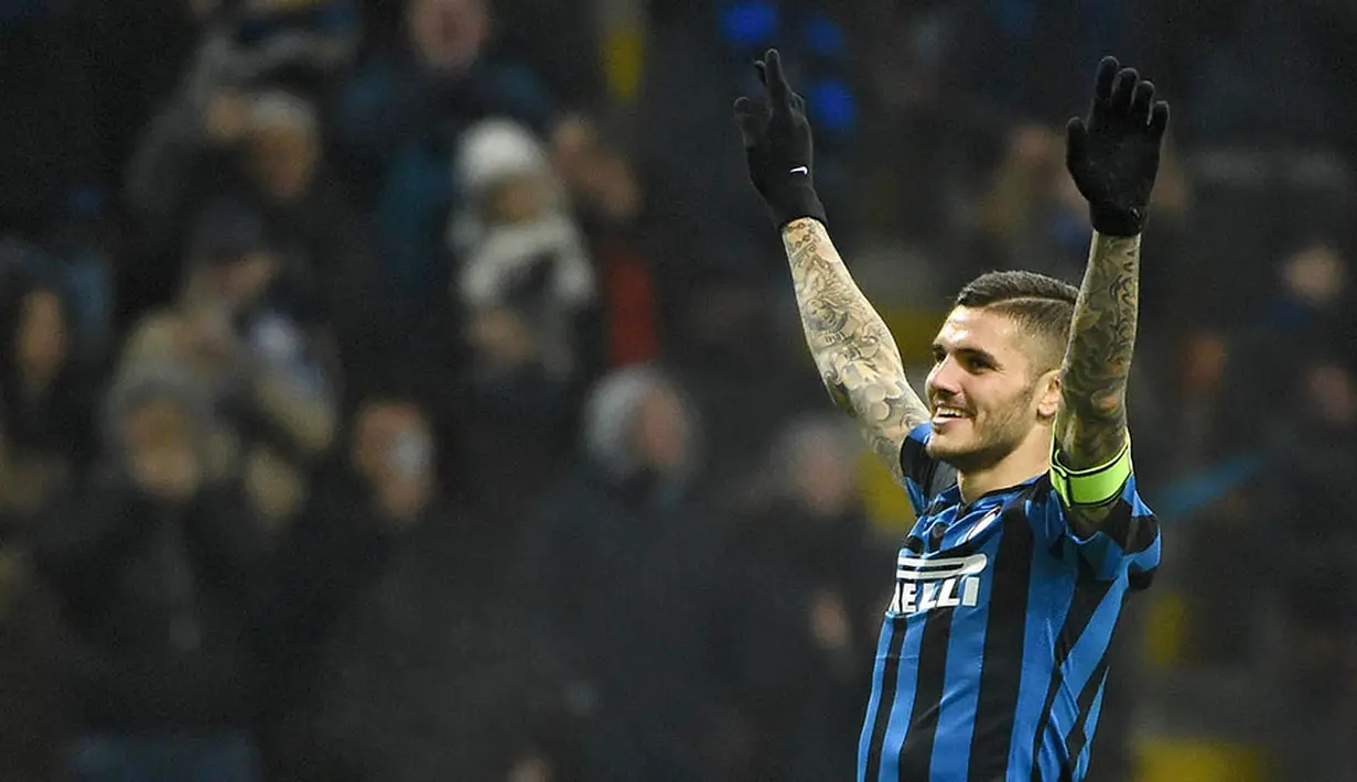 Striker Inter Milan, Mauro Icardi, merayakan gol yang dicetaknya ke gawang Palermo pada laga Serie A di Stadion Giuseppe Meazza, Italia, Minggu (6/3/2016). Inter berhasil menang 3-1 atas Palermo. (EPA/Daniel Dal Zennaro)