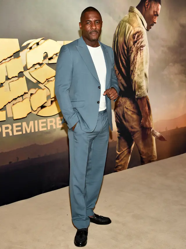 Idris Elba Tampil Necis Saat Pimpin Para Bintang di Pemutaran Perdana Film Beast
