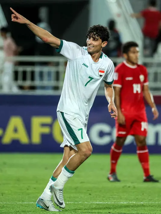 Di babak tambahan waktu, pemain Irak Ali Jasim berhasil menjebol gawang timnas Indonesia U-23 dan merubah skor menjadi 2-1. (Karim JAAFAR/AFP)