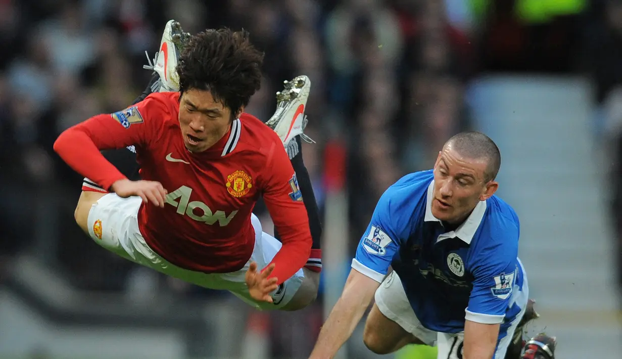 Park Ji-sung mampu bertahan selama 7 musim di Old Trafford dan langsung memberi warna tersendiri dalam permainan Setan Merah. Ia total bermain dalam 204 laga di semua ajang dengan torehan 28 gol dan 29 assist. (AFP/Andrew Yates)