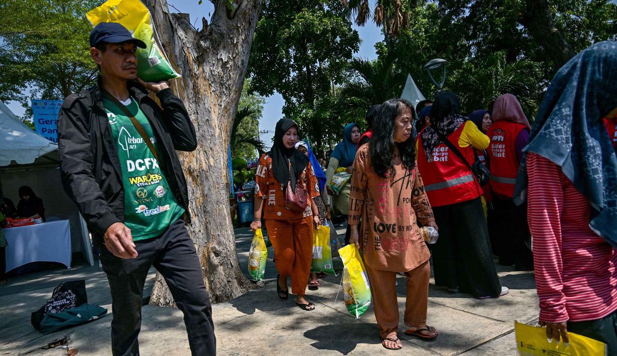 Stok beras yang disiagakan untuk kegiatan GPM Serentak di Jatim sebanyak 2.491 ton. (Juni KRISWANTO/AFP)