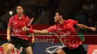 Pebulutangkis ganda campuran Indonesia, Tontowi Ahmad/Liliyana Natsir, saat bertanding melawan pebulutangkis Rusia, Rodion Kargaev/Ekaterina Bolotova dalam Kejuaraan Dunia Bulutangkis 2015 di Istora Gelora Bung Karno, Senayan, Jakarta. Selasa (11/8/2015).