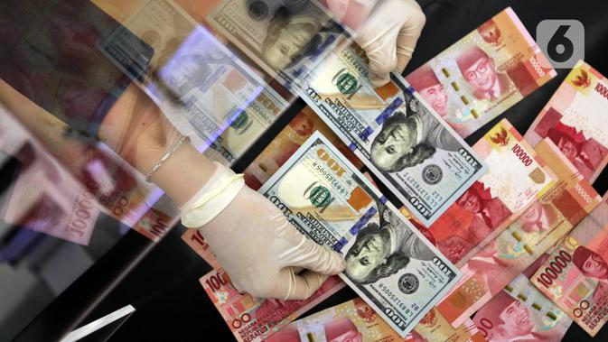 Rupiah Menguat ke 14.500 per Dolar AS, Potensi Tekanan Masih Besar - Vimarsana News