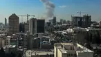 Kepulan asap membubung setelah ledakan yang dilaporkan terjadi di Teheran, Iran, pada 28 Februari 2026. Dua ledakan keras terdengar di Teheran, Iran, pada 28 Februari 2026 pagi hari. (Foto oleh AFP)