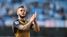 Pemain Arsenal, Jack Wilshere menempati urutan keempat pemain pilihan fans Manchester City dengan suara sebanyak 10%. (AFP/Paul Ellis)