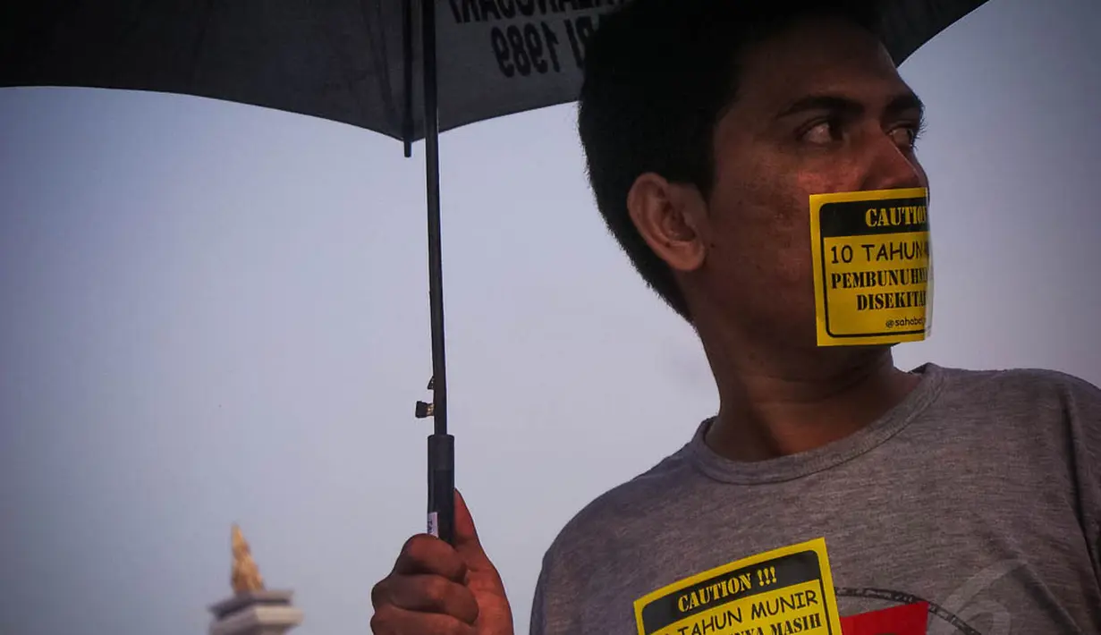 Di depan Istana Negara, massa menuntut agar dalang pembunuhan Munir segera diadili, Jakarta, (4/9/14). (Liputan6.com/Faizal Fanani)