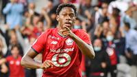 Jonathan David - Pemain timnas Kanada tampil tajam untuk Lille musim ini. Dia berhasil mencetak 16 gol dari 34 pertandingan di semua kompetisi. Bomber yang kini memasuki usia 22 tahun cocok untuk investasi jangka panjang Manchester United. (AFP/Denis Charlet)