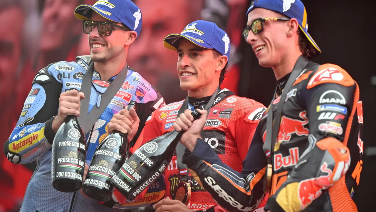 Marc Marquez (Tengah)