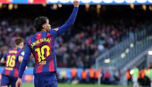 Lamine Yamal berhasil menyumbangkan satu gol saat Barcelona menang 3-0 atas Mallorca pada laga pekan ke-23 La Liga di Camp Nou, Sabtu (7/2/2026) malam WIB. (AFP/Josep Lago)