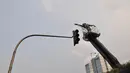 Pembersihan Patung Dirgantara atau Patung Pancoran siap memasuki tahap akhir, Jakarta, Jumat (28/8/14).(Liputan6.com/Miftahul Hayat)