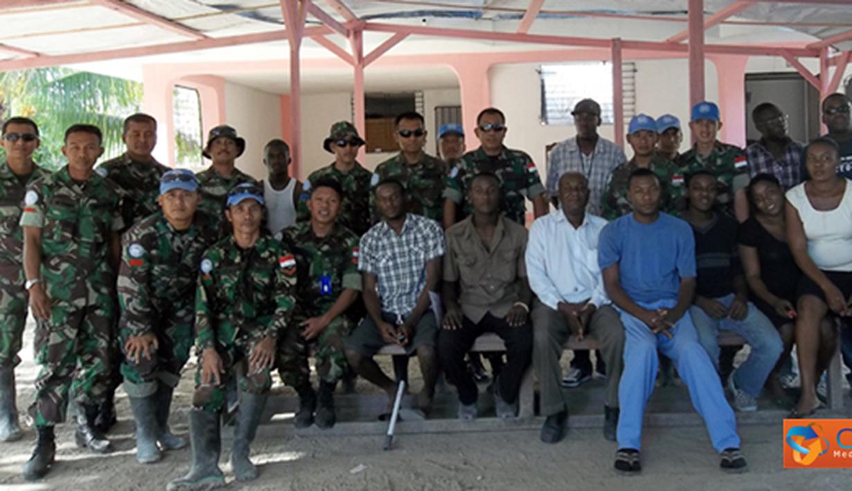 Citizen6, Haiti: Pekerjaan konstruksi yang dipimpin oleh Danton Pleton Zeni Konstruksi, Lettu Czi Ali Isnaini mengerahkan 18 orang pasukannya. (Pengirim: Badarudin Bakri)