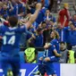 Islandia berhasil mengamankan tiket 16 besar Piala Eropa 2016, usai membungkam Austria dengan skor 2-1 pada laga terakhir Grup F di Stade de France, Paris, Rabu (23/6/2016). (AFP/Franck Fife)